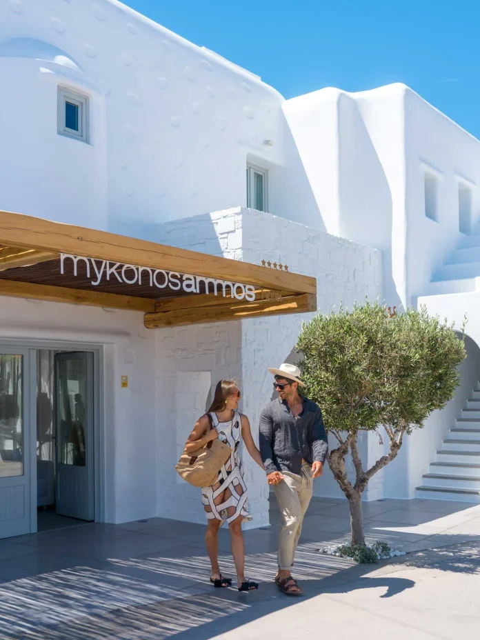 Mykonos-Ammos-Entrance-couple-ready-to-explore-mykonos